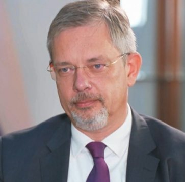 H.E. Mr. Denis Alipov